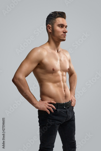 Confident fit man looking away