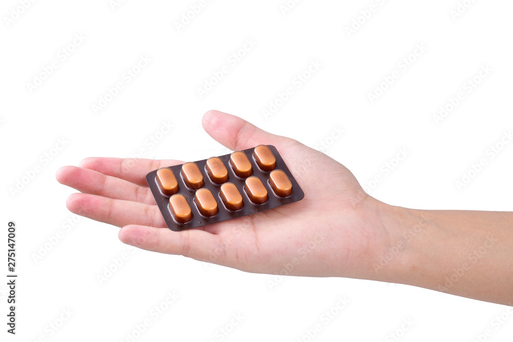 medicine in woman hand isolated on white background medicine in woman hand isolated on white background