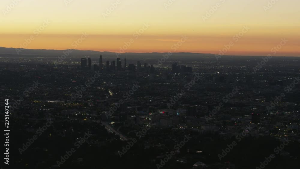 Aerial view Los Angeles city lights at sunrise Aerial view Los Angeles city lights at sunrise