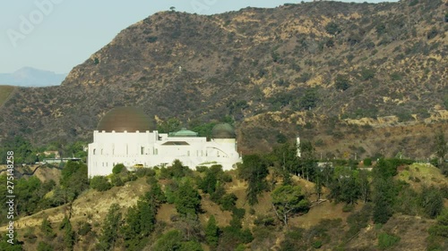Aerial sunrise view Hollywood Hills landmarks Los Angeles