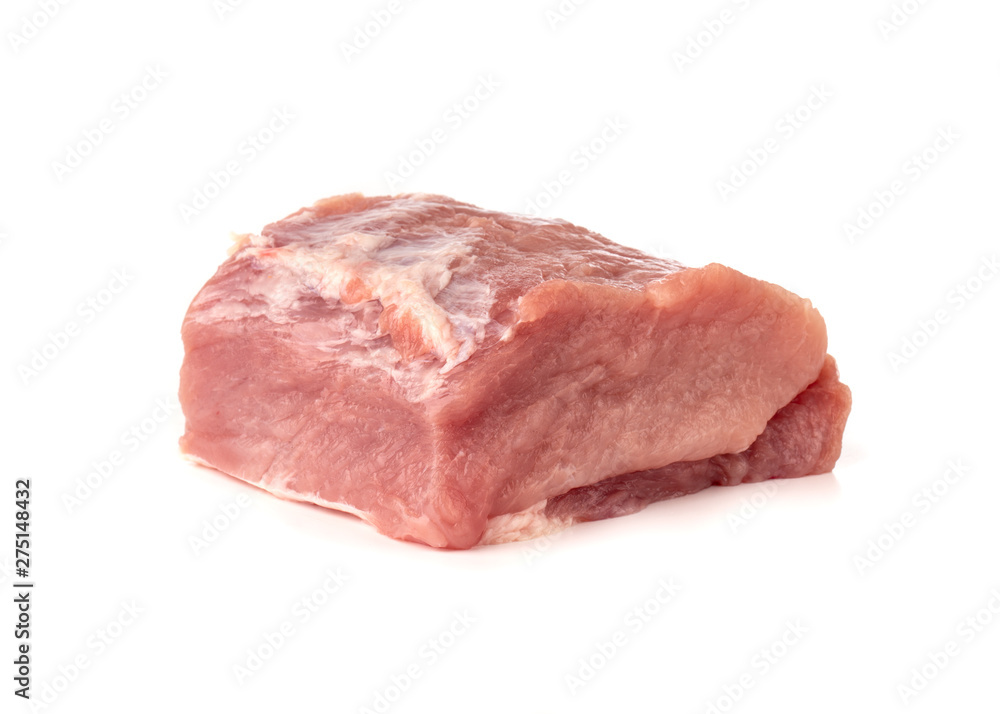 A piece of meat on a white background. Raw piece of pork close-up.