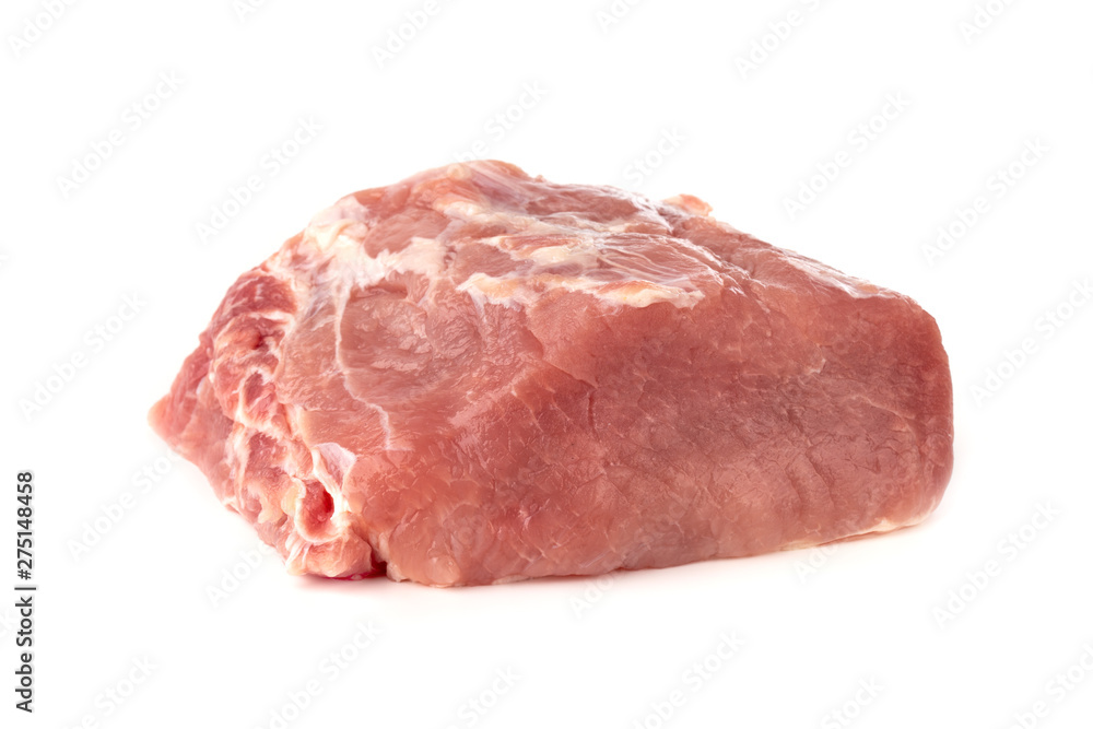 A piece of meat on a white background. Raw piece of pork close-up. A piece of meat on a white background. Raw piece of pork close-up.