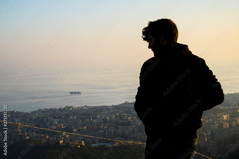 boy silhouette at sunset