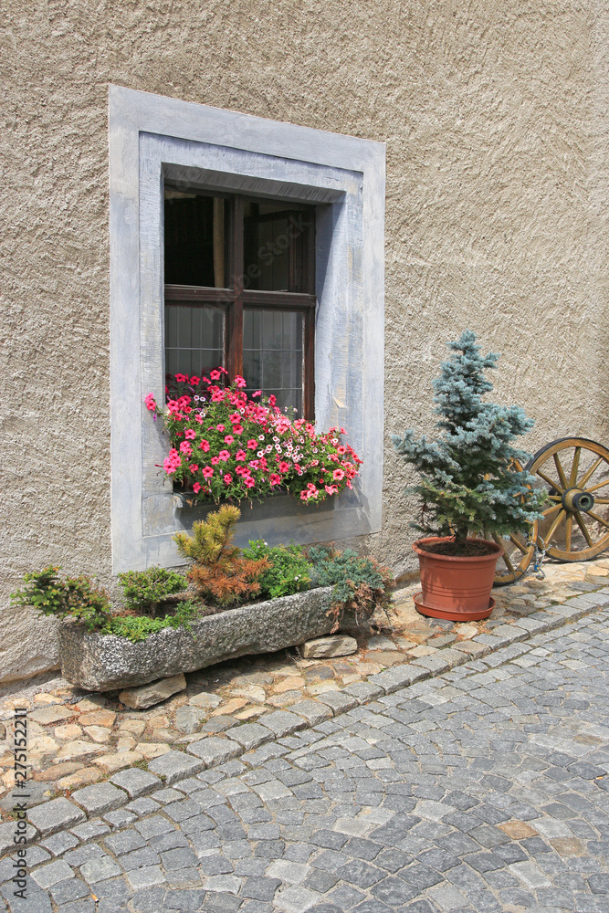Detail of traditional window decorated with flowers