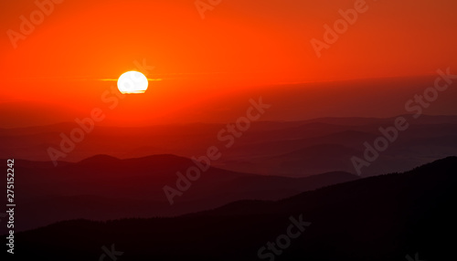 sunset over the countryside with brilliantly shaped landscape and gorgeous sunshine, 1200 meters above sea level, Central Europe, Czech Republic, Jested