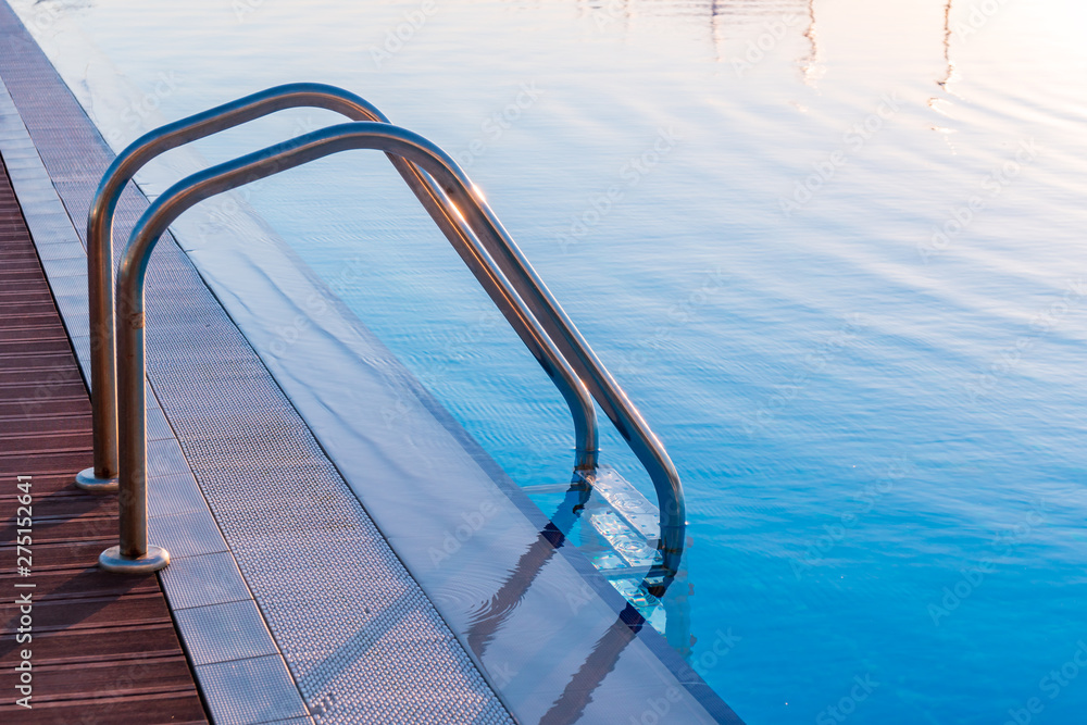 Fototapeta premium Swimming pool in curved shape with stairs