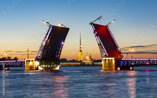 Drawn Palace Bridge and Peter and Paul Fortress at summer night, St. Petersburg, Russia