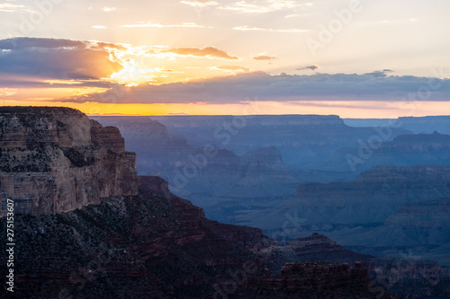 The setting sun sinking below the horizon of the Grand Canyon, near Yavapai point on the southern canyon rim. © Goldilock Project