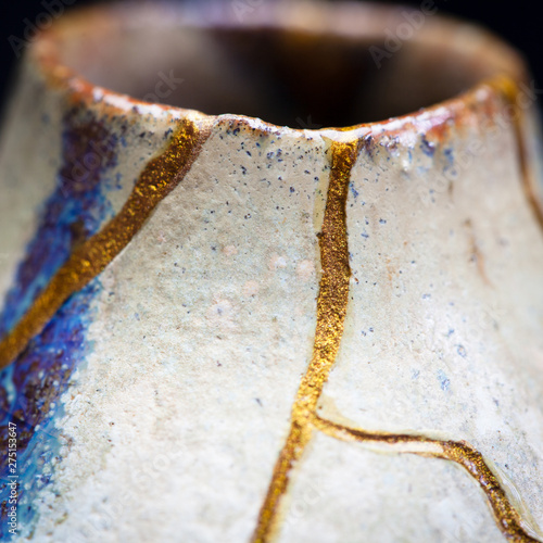A macro shot of a vase I repaired with gold powder and urushi lacquer.