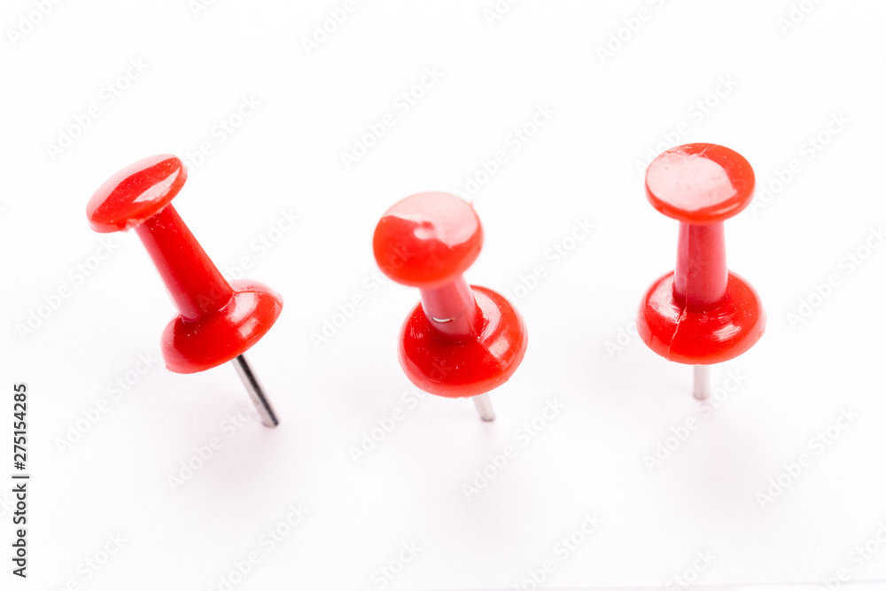 Push red pins isolated on white background. Push red pins isolated on white background.