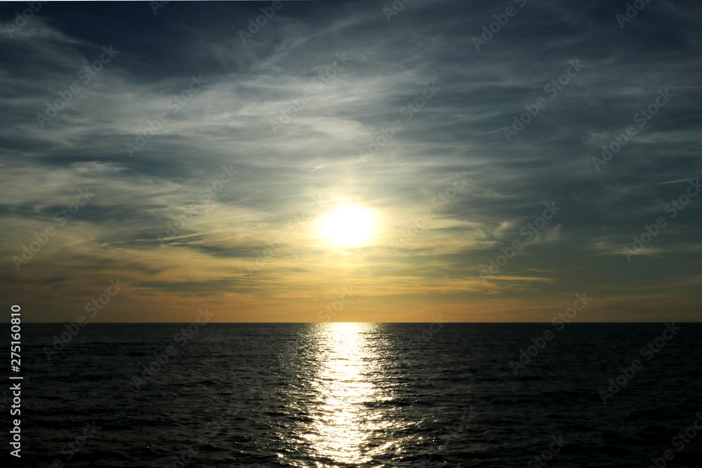 Sunset on the Baltic Sea with a beautiful sky, background. Palanga, Lithuania Sunset on the Baltic Sea with a beautiful sky, background. Palanga, Lithuania