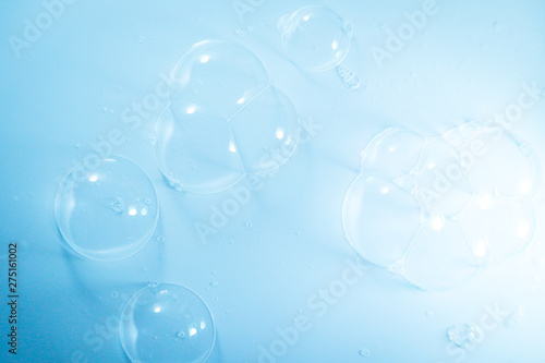 Beautiful abstract close up color blue and white soap bubbles background and wallpaper