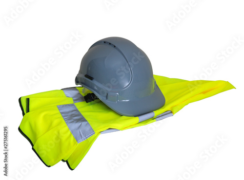 Gray helmet and yellow vest isolated on white background.