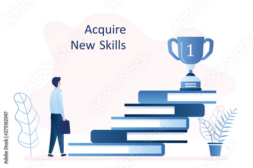 Stack of books and winner cup on top,businessman with bag,acquire new skills