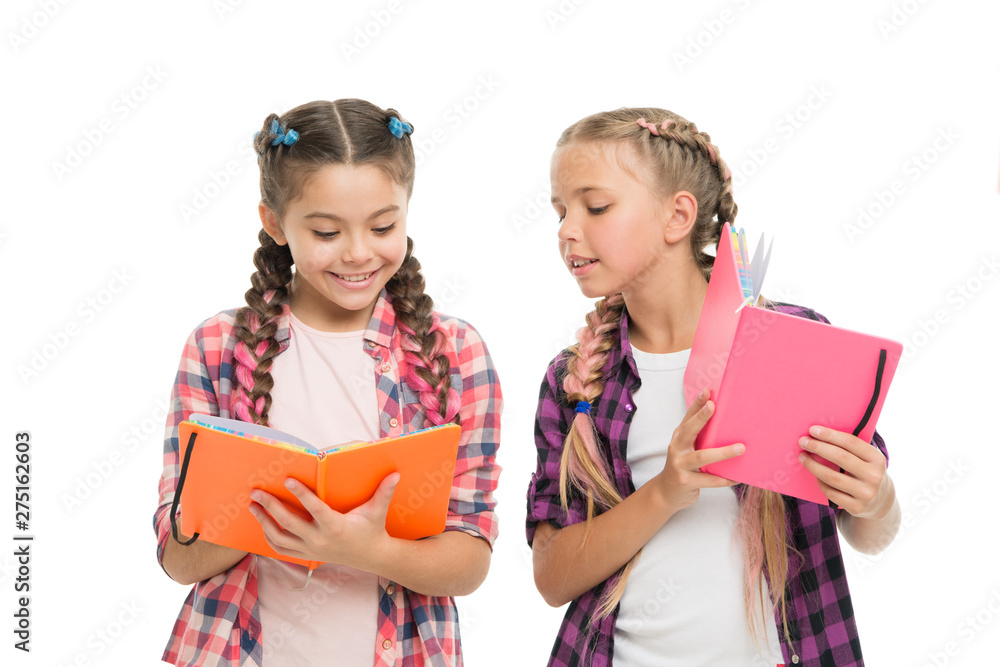 Reading skills. Cute small children holding books. Adorable little girls with school exercise books. Preparing activity books for writing. Study language. Achieve knowledge. Education concept Reading skills. Cute small children holding books. Adorable little girls with school exercise books. Preparing activity books for writing. Study language. Achieve knowledge. Education concept