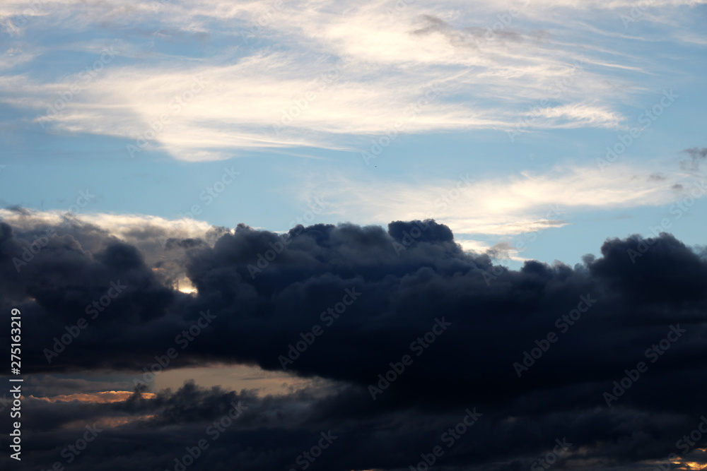 A view of the dark clouds during sunset
