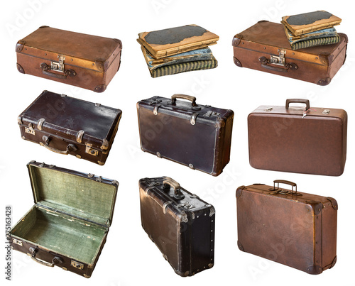 Old shabby vintage suitcases and books isolated on white background. Retro style