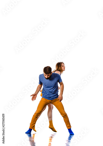 Hip Hop dancers in dynamic action isolated on white background © qunica.com