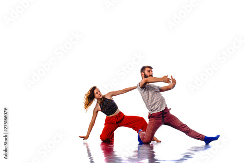 Young talented dancers practicing to the contest, isolated on white