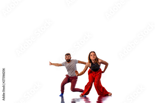 Portrait of a young dancing friends, isolated on white