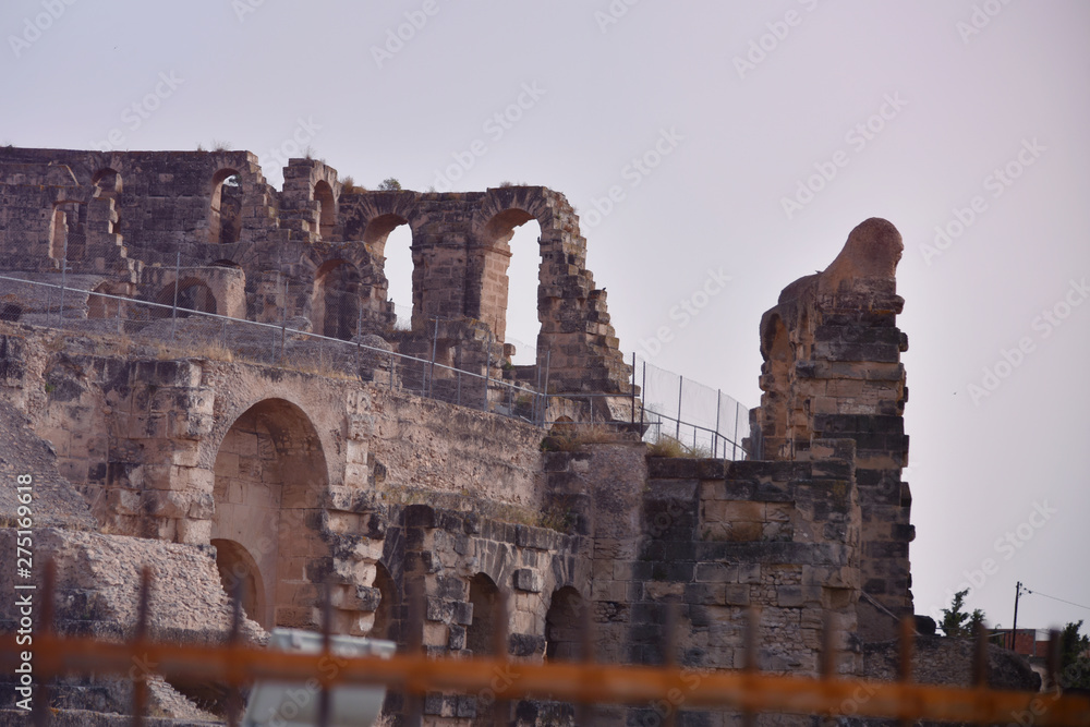 Fototapeta premium The ruins of ancient roman amphitheater in El-Jem. The largest colosseum in North Africa. Mahdia governorate, Tunisia.