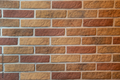 Modern brick wall  brown brick wall textur for background . New multi-colored brick wall. texture background.