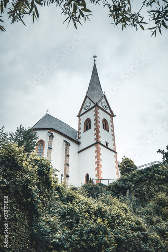 the Church of Maria Woerth at lake woerthersee at sunrise