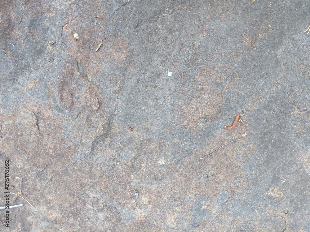 Colorful sand stone by a river. Background, texture, or blending element. Colorful sand stone by a river. Background, texture, or blending element.