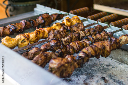 Meat kebab on skewers fried on the grill.