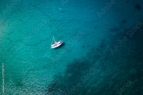 lone sail boat © derek