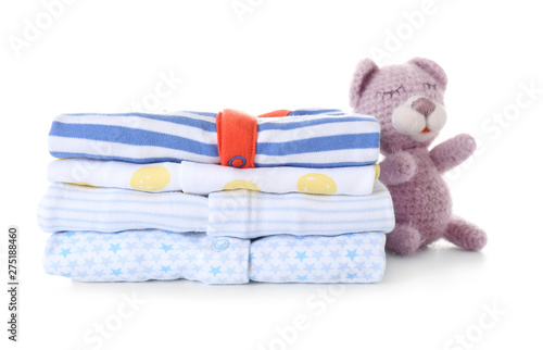 Stack of baby clothes on white background © Pixel-Shot