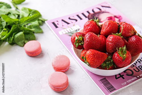 Bowl with ripe strawberry, ...