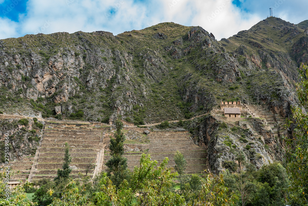 View of the moutain side and Ollantaytambo ruins View of the moutain side and Ollantaytambo ruins