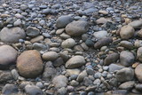 Loads of different colored boulders or pebbles