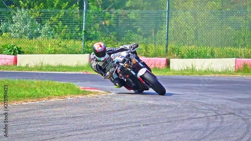 slow motion Motorcycle cornering on racing circuit