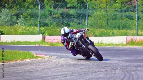 slow motion Extreme racer on corner of racing track