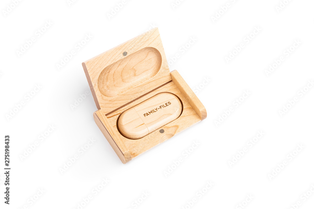 Computer USB flash drive, made in a wooden case lies in an open gift wooden case engraved with Computer USB flash drive, made in a wooden case lies in an open gift wooden case engraved with