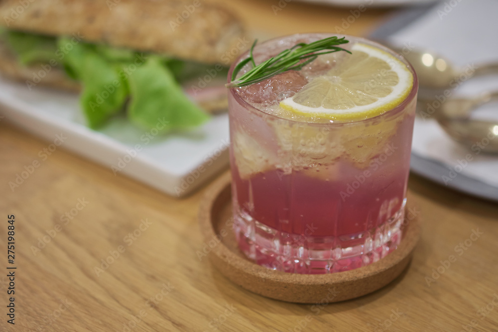 butterfly pea Mocktail with green mint and lime on wood table butterfly pea Mocktail with green mint and lime on wood table