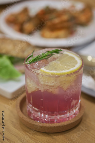 Wallpaper Mural butterfly pea Mocktail with green mint and lime on wood table Torontodigital.ca