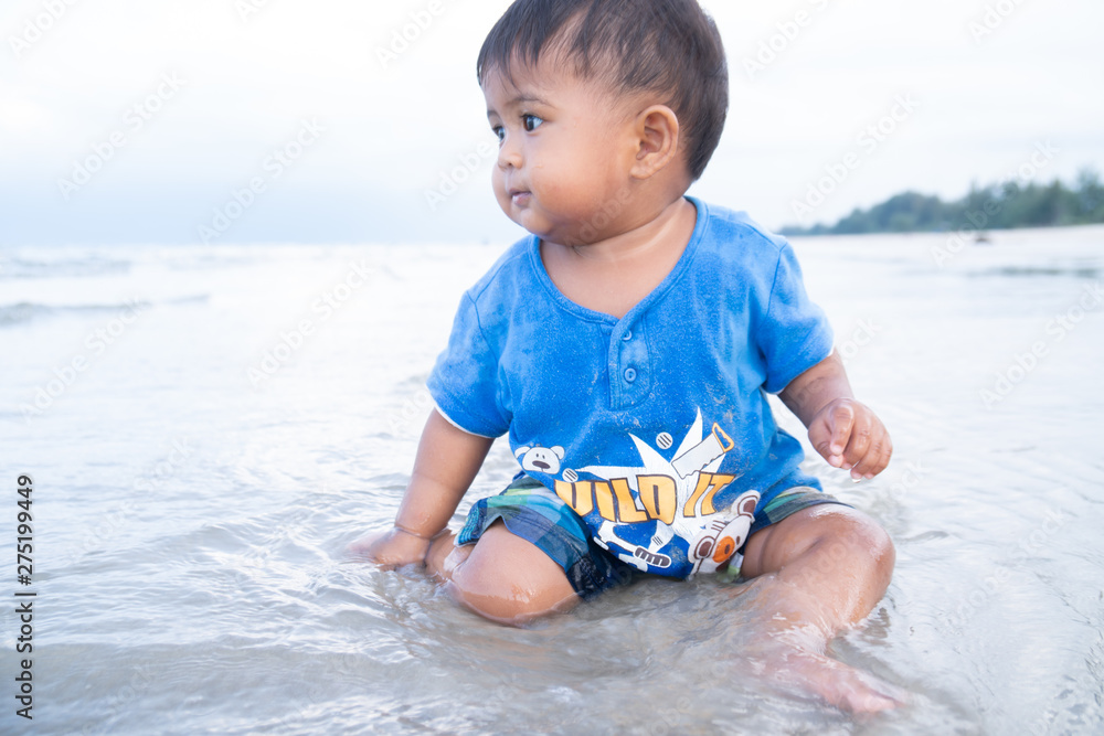 cute little baby boy play on the beach cute little baby boy play on the beach