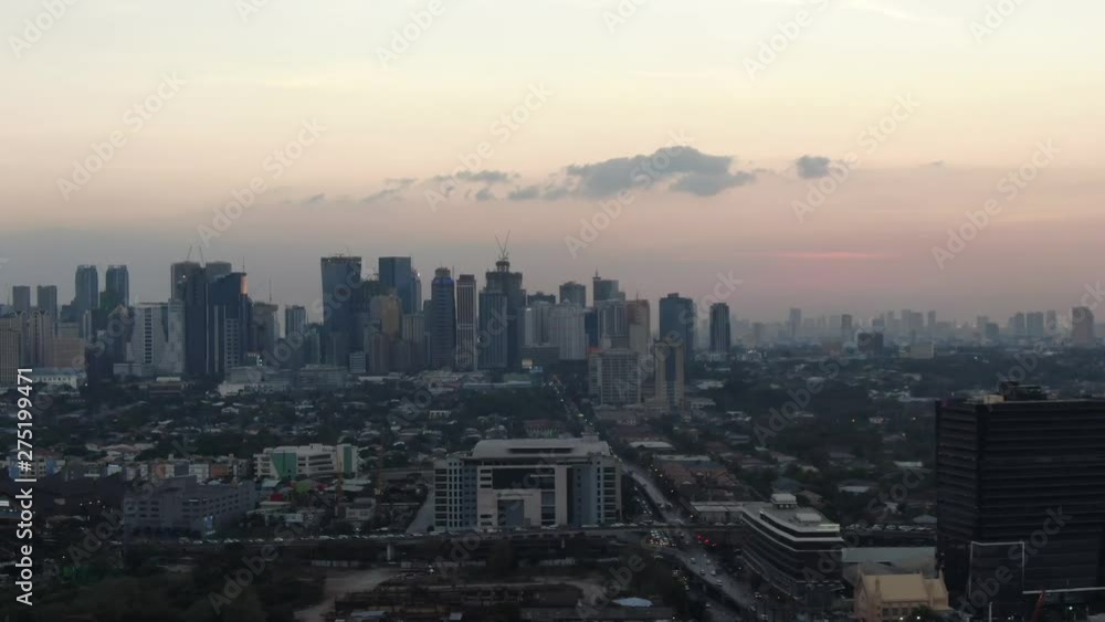During the gloaming twilight hundreds of cars travel home from Ortigas and Metro Manila During the gloaming twilight hundreds of cars travel home from Ortigas and Metro Manila