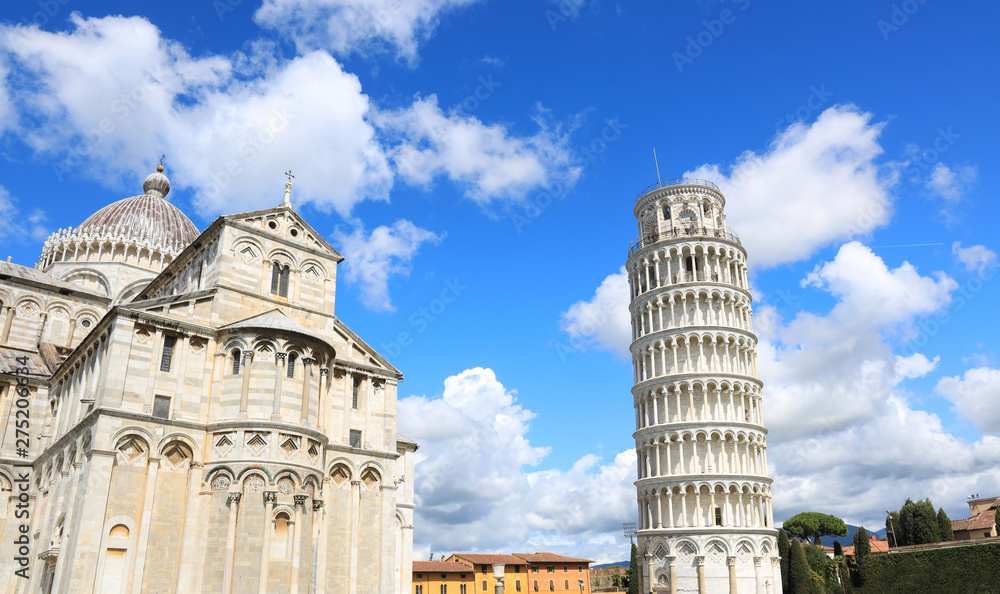 Beautiful view of Cloudy blue sky in Pisa Cathedral (Duomo di Pisa) with Leaning Tower  (Torre di Pisa) Tuscany, Italy.The Leaning Tower of Pisa is one of the main landmark in Italy.