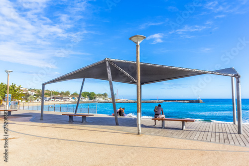 beach with chairs and umbrellas, Saint-Gilles, Réunion 