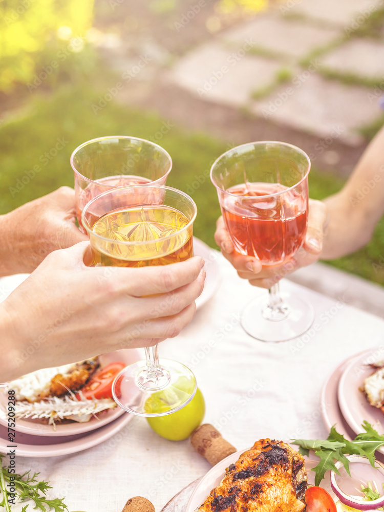 People drink rose and white wine. Pati Backyard People drink rose and white wine. Pati Backyard
