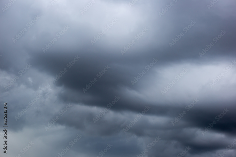 The datk gray storm clouds with thunder on the sky before raining. The datk gray storm clouds with thunder on the sky before raining.