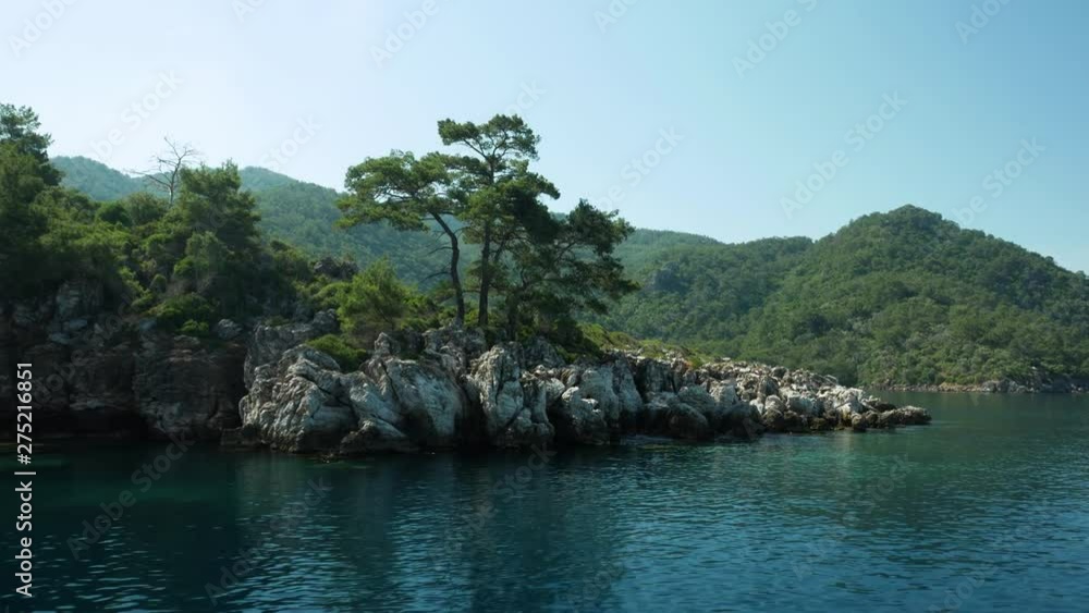 Walk around the ridge of a beautiful island with trees Walk around the ridge of a beautiful island with trees