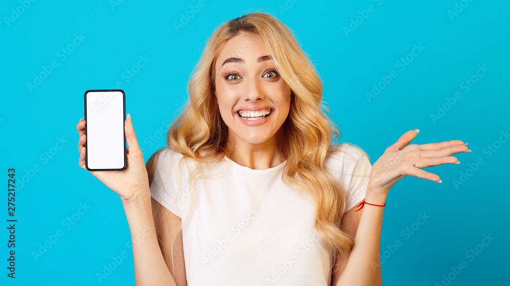 Full Sale. Surprised Girl Showing Blank Smartphone Screen Full Sale. Surprised Girl Showing Blank Smartphone Screen