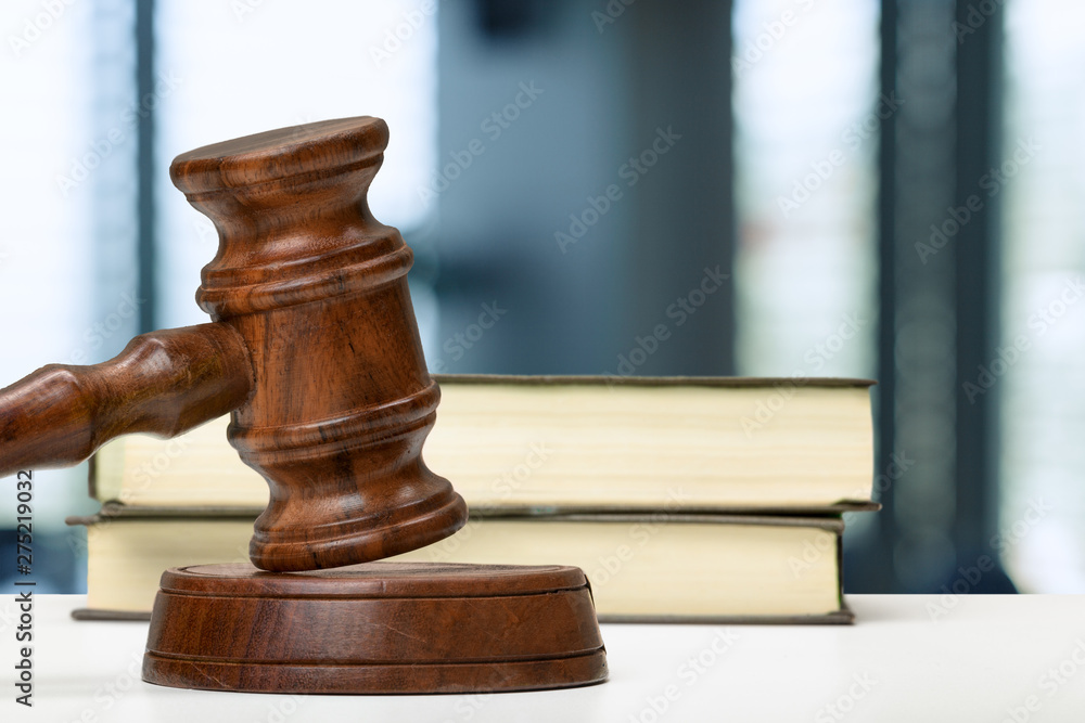 Law and justice concept image. Brown wooden background Law and justice concept image. Brown wooden background