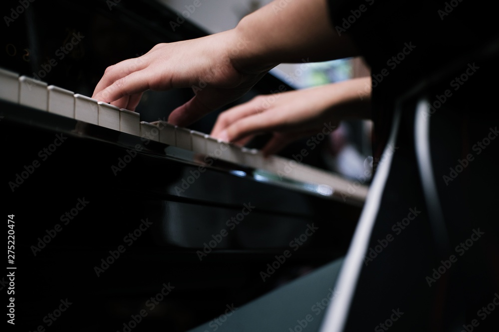 Beautiful asian girl learn to play piano. Beautiful asian girl learn to play piano.
