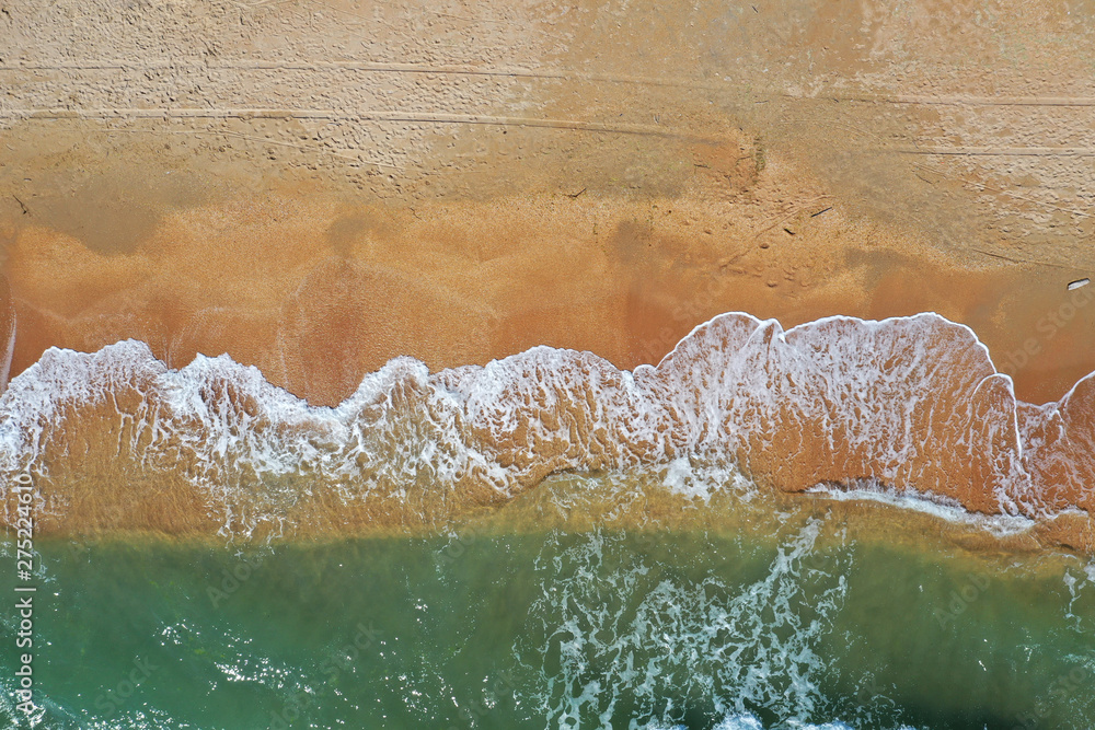 Fototapeta premium Sandy beach with sea top view